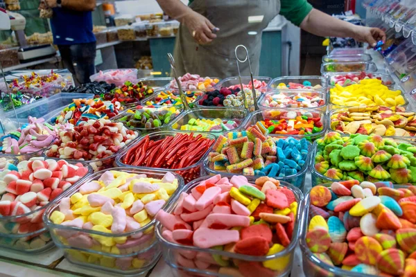 Confectionery in displays. Candy store in a Spanish market.