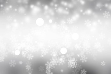 Beyaz ve gri Bokeh bulanık arkaplan. Gümüş ve beyaz bokeh ışıkları söndü. Soyut arkaplan duvar kağıdı. Beyaz karlı yumuşak ışıklar soyut arkaplan.