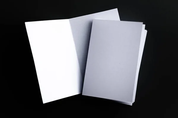 Blank Mock Paper Brochure Magazine Isolated Black Table Changeable Background —  Fotos de Stock