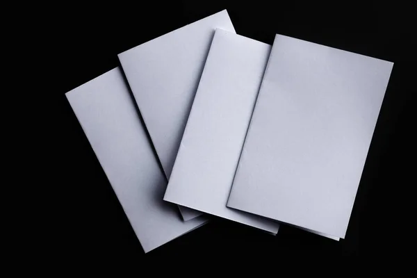 Blank Mock Paper Brochure Magazine Isolated Black Table Changeable Background — Fotografia de Stock