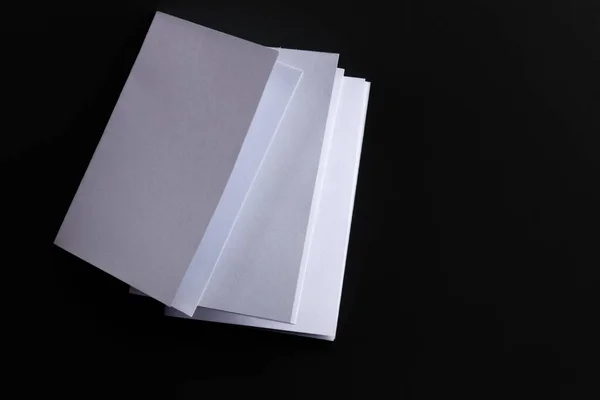 Blank Mock Paper Brochure Magazine Isolated Black Table Changeable Background — Zdjęcie stockowe