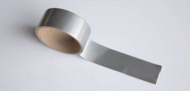 gray tapes on white background. Torn sticky tape, adhesive pieces.