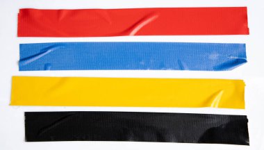 Set of yellow, green, black tapes on white background. Torn horizontal and different size sticky tape, adhesive pieces.