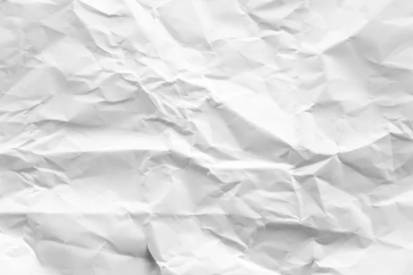 white and gray crumpled paper texture background. crush paper so that it becomes creased and wrinkled.