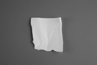 Blank portrait mock-up crumpled paper. brochure magazine isolated on gray background, changeable background / white paper isolated.