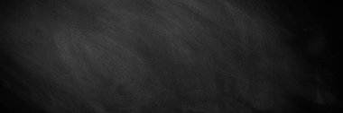 wide Chalkboard texture background. blackboard wall backdrop wallpaper, dark tone. black banner billboard.