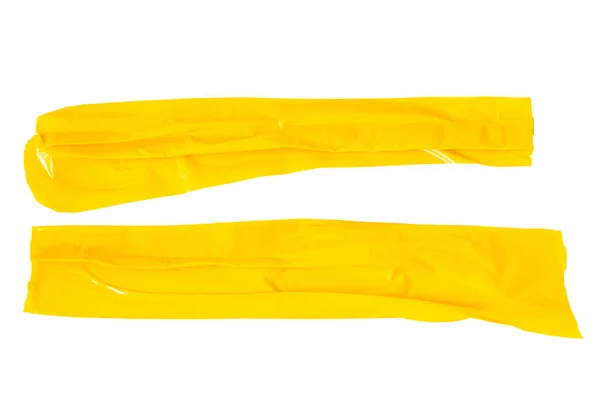 白い背景の黄色いテープ水平と異なるサイズの黄色の粘着テープ 接着剤の部分をねじる — ストック写真