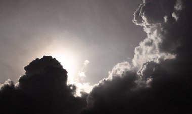 yellow fluffy clouds in the sky. warm tone.