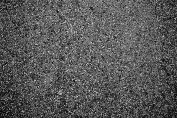 wide black asphalt texture. asphalt road. stone asphalt texture background black granite gravel.