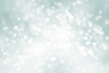 Beyaz kar taneleri bulanık gri arka planda, Lüks Noel 'de pırıl pırıl parlıyor.