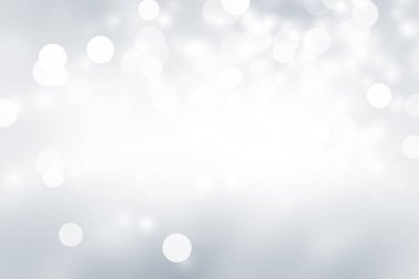 Beyaz kar taneleri bulanık gri arka planda, Lüks Noel 'de pırıl pırıl parlıyor.