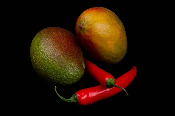 Two Mangoes Two Red Hot Chili Pepers Isolated Black Background — Stock Photo, Image