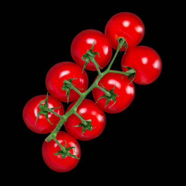 番茄束隔离在坚实的黑色背景上 顶部视图 — 图库照片