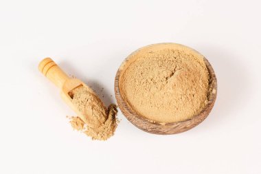 Healing earth powder in a bowl, supplement and antioxidant for to detox the body, alternative medicine 