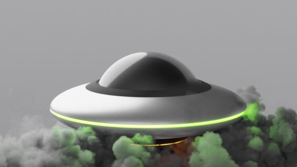 Летающая тарелка НЛО на сером фоне — стоковое видео