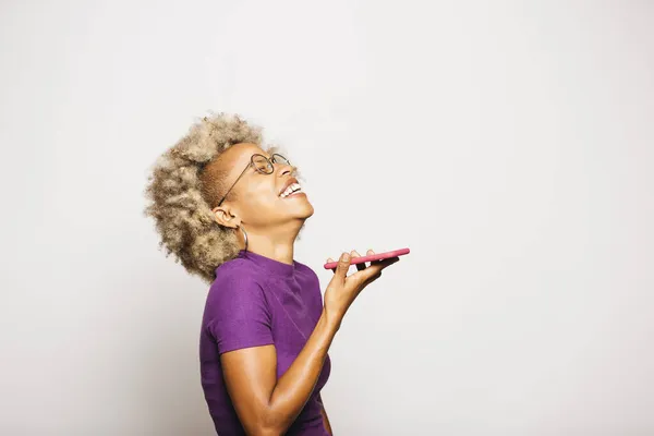 Portrait Smiling Young Woman Using Smart Phone While Standing White — Stok Foto