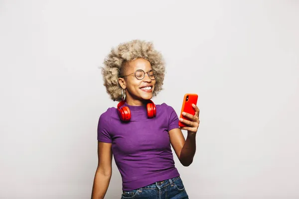 Portrait Smiling Young Woman Using Smart Phone Headphone Dancing White — Stok Foto