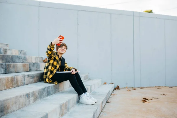 Teenager Smiling Student Boy Taking Selfie Red Smartphone Sitting Stairs — Stockfoto