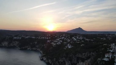 Cala Ambolo, Xabia, Alicante, İspanya 'da hava kararıyor.