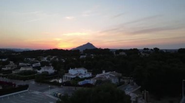 Cala Ambolo, Xabia, Alicante, İspanya 'da hava kararıyor.