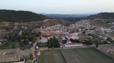 Aerial views from Rubielos de Mora, Teruel, Aragn, Spain. Drone is flying near the town during the sunset
