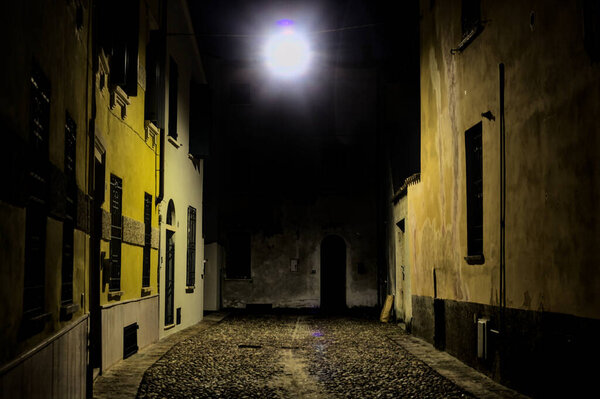 Alley in an italian town at night