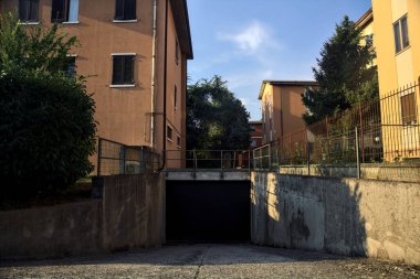 Downward access to a garage in a condominium