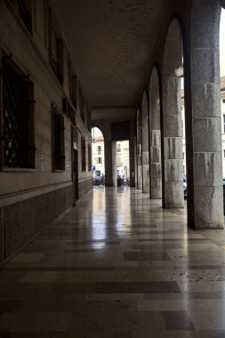 Tall modern porchway on a cloudy day