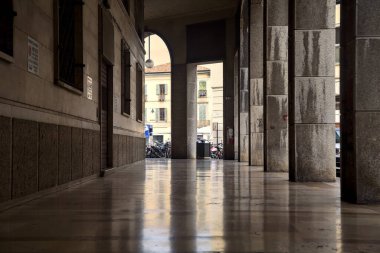 Tall modern porchway on a cloudy day