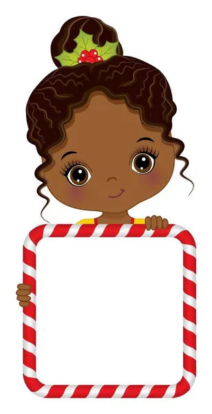 Linda menina afro-americana segurando moldura de doces de Natal para personalizar seu texto. Vector menina preta com bandeira —  Vetores de Stock