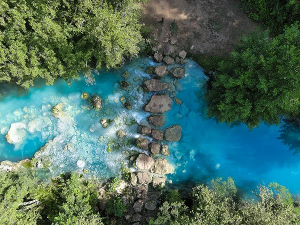 vertical aerial view of the stone bridge of the elsa river in tuscany