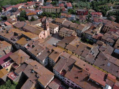 aerial view of the historic center of the Tuscan town of montaione at sunset