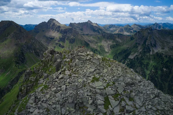 panoramic aerial view of climbers on the mountain overlooking the lake of bombasel trentino