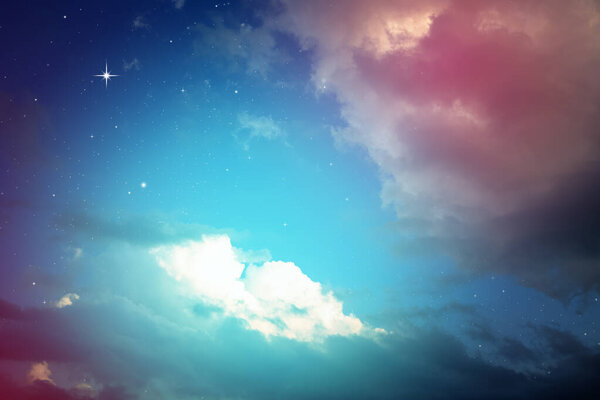 Colorful night sky with cloud and stars in blue tone