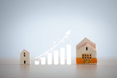 ev modelleri ticaret grafiğiyle ev yatırım kavramını gösteriyor