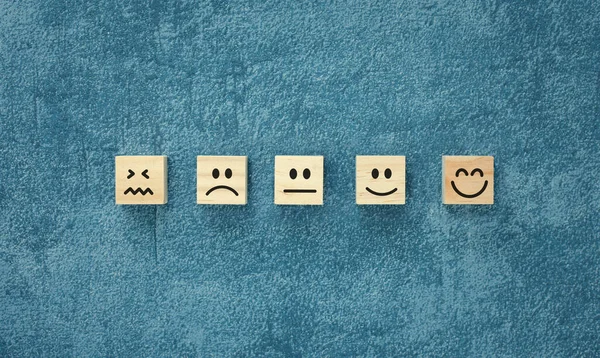 Various Emotion Faces Wooden Cubes Arranged Table Satisfaction Survey Mental — Stockfoto