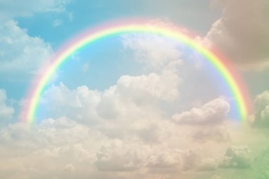 beautiful pastel sky with semicircle rainbow, fantasy background