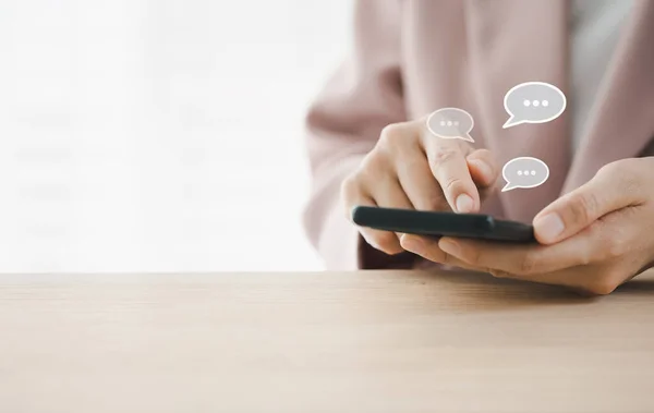 Closeup Woman Chatting Smart Phone Message Icon While Working Wireless — Fotografia de Stock