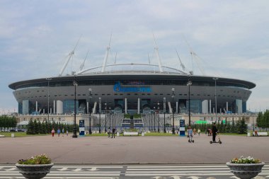 SAINT-PETERSBURG . RUSSIA. The road to the modern stadium that hosted the FIFA World Cup against the backdrop of a gray, cloudy sky.