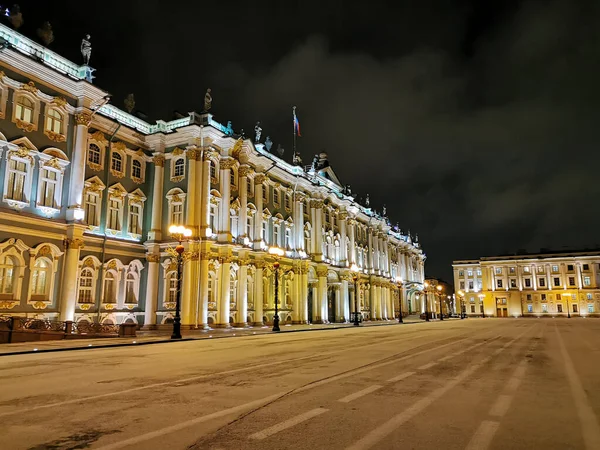 The Winter Palace on Palace Square in St. Petersburg on New Year\'s Eve in an early winter morning against the backdrop of a black sky.