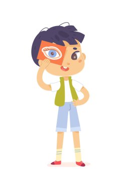 Çocuk görme duyusunu öğreniyor, elinde insan gözüyle kart tutuyor, görme yetisini inceliyor.