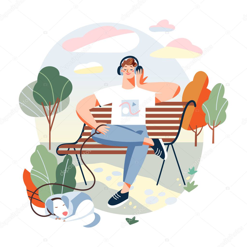 Relaxing man in city park, happy guy sitting on bench with earphones, listening to music