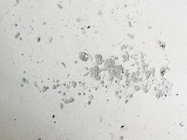 White wall texture with gray dots