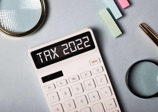Imposto 2022, sistema de tributação. Palavra sobre calculadora — Fotografia de Stock