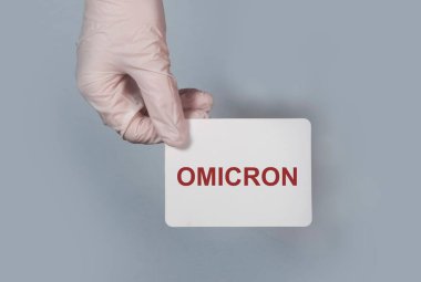 Koronavirüsün Omicron versiyonu. Kağıt üzerinde kelime