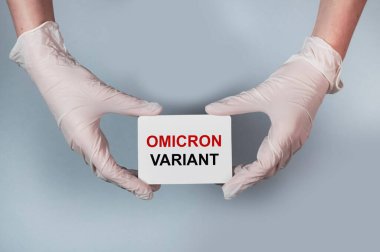 Koronavirüsün Omicron versiyonu. Kağıt üzerinde kelime