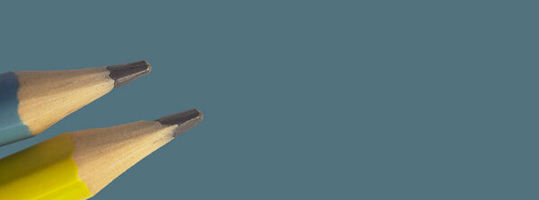 pencil tips closeup on background. Education banner design for promo