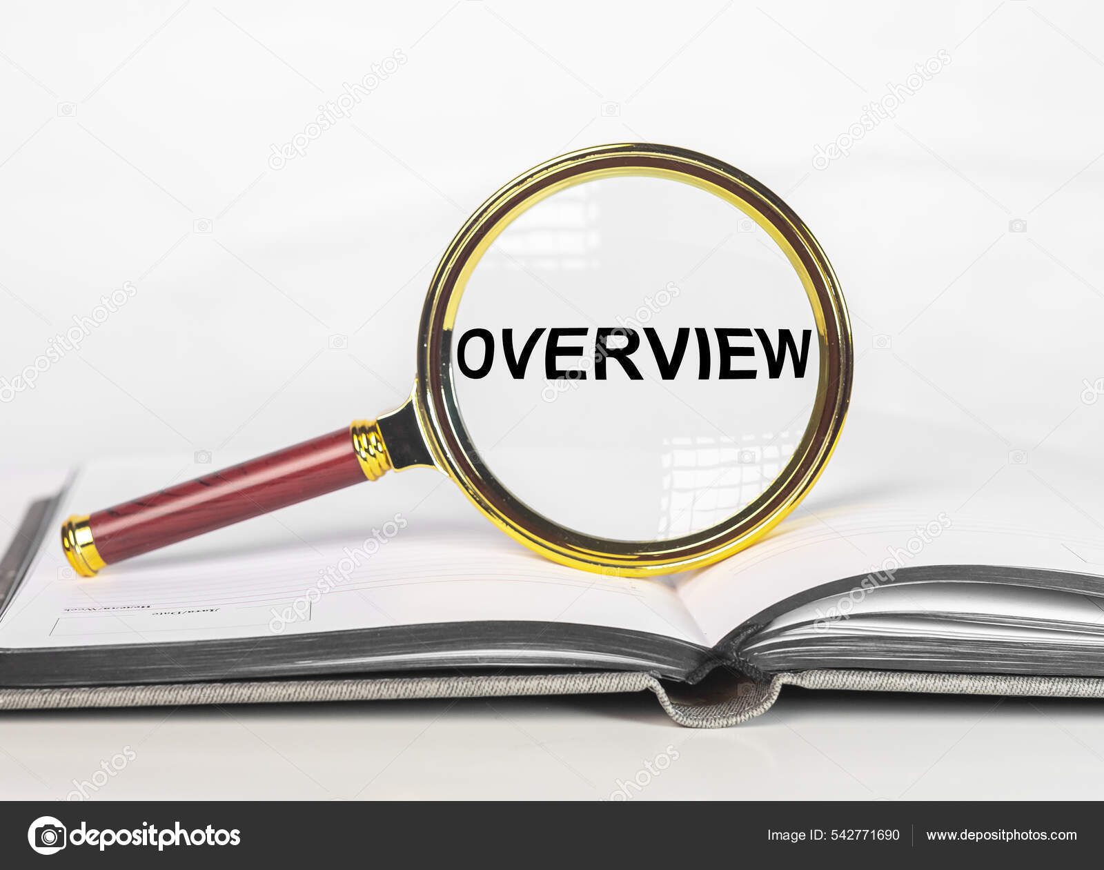 Overview word through magnifying lens. Recap and summary concept
