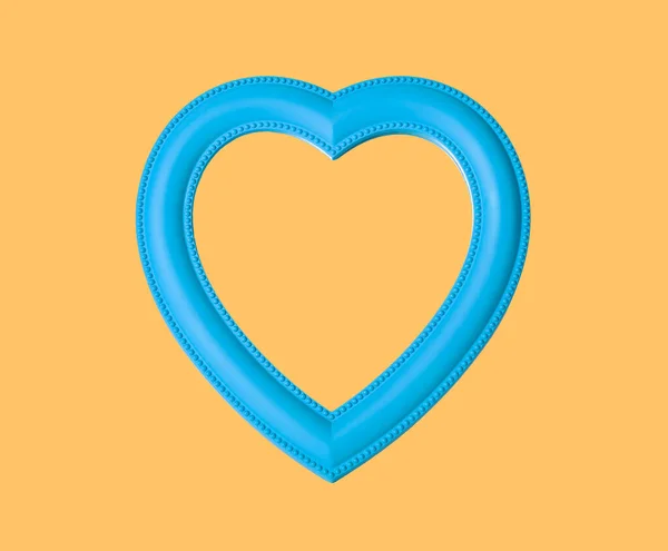 Contorno del corazón de color azul sobre fondo amarillo. Concepto de amor —  Fotos de Stock