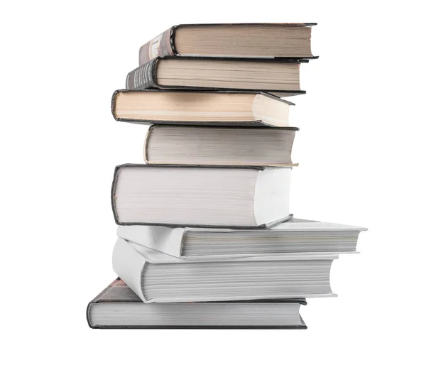 단단 한 책들이 흰 배경 위에 쌓여 있다. 교육, 정보 습득, 시험 준비 — 스톡 사진